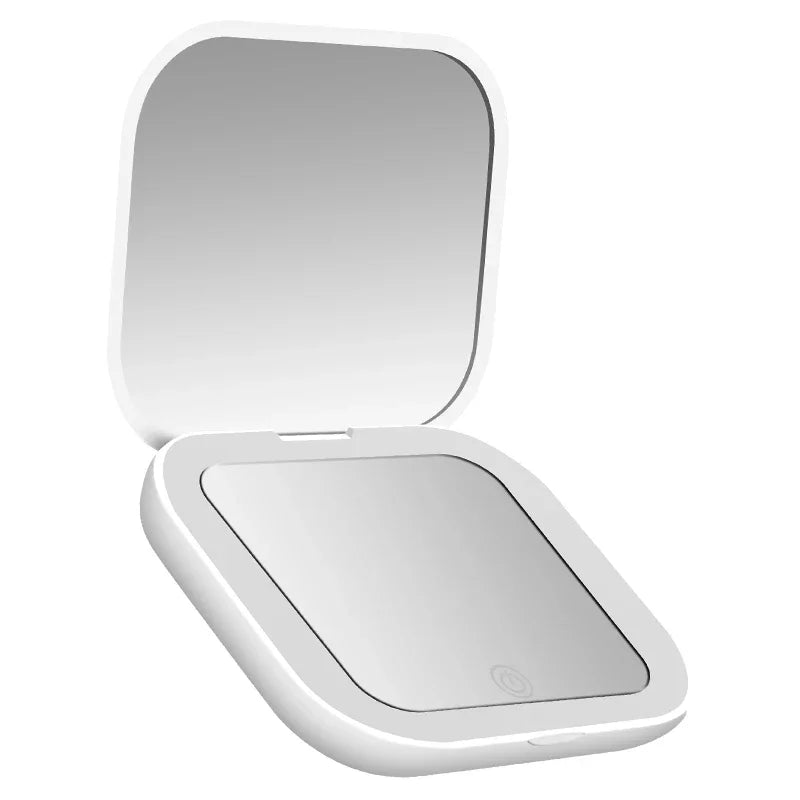 Portable Hand Held Pocket Makeup Mirror 2X magnifying with LED light capabilities.