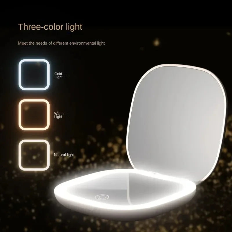 Portable Hand Held Pocket Makeup Mirror 2X magnifying with LED light capabilities.