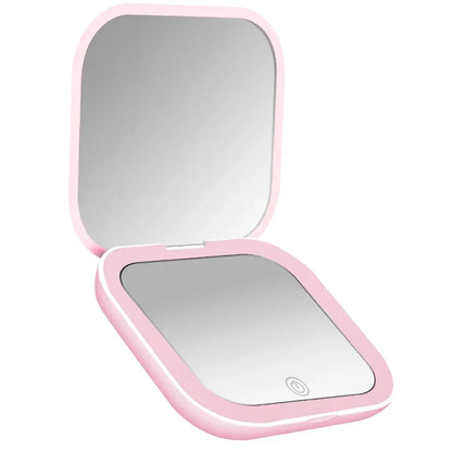 Portable Hand Held Pocket Makeup Mirror 2X magnifying with LED light capabilities.