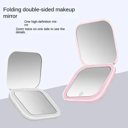 Portable Hand Held Pocket Makeup Mirror 2X magnifying with LED light capabilities.