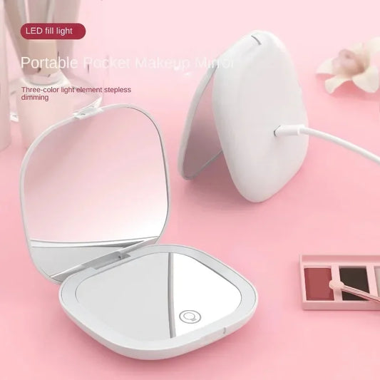 Portable Hand Held Pocket Makeup Mirror 2X magnifying with LED light capabilities.