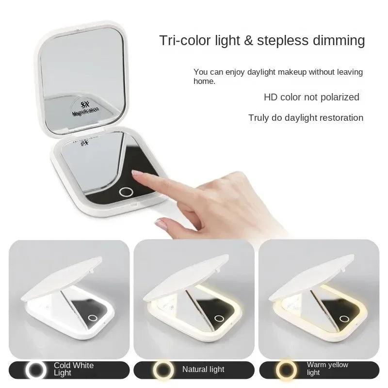 Portable Hand Held Pocket Makeup Mirror 2X magnifying with LED light capabilities.